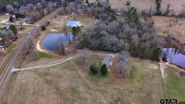 a view of wooden floor with a window