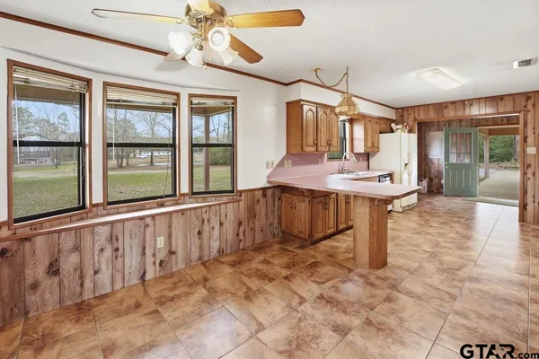 a view of a lake with houses in the back