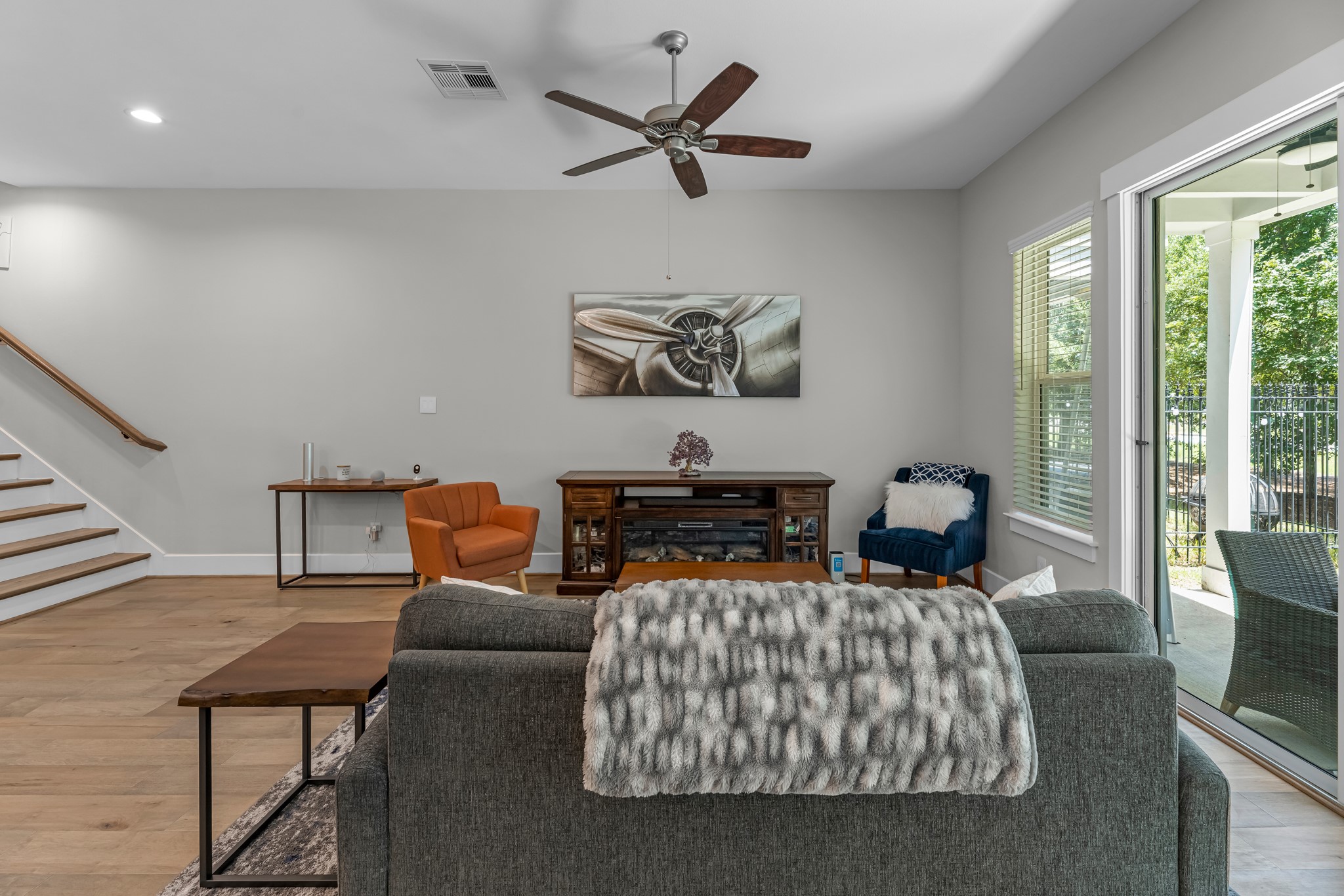 11 Thorpe Lane Spring, TX 77389 - Photo 16 of 34 Your family room has ample space to entertain family and friends. This space features beautiful floors, fresh paint, ceiling fan with lighting, and high ceilings.