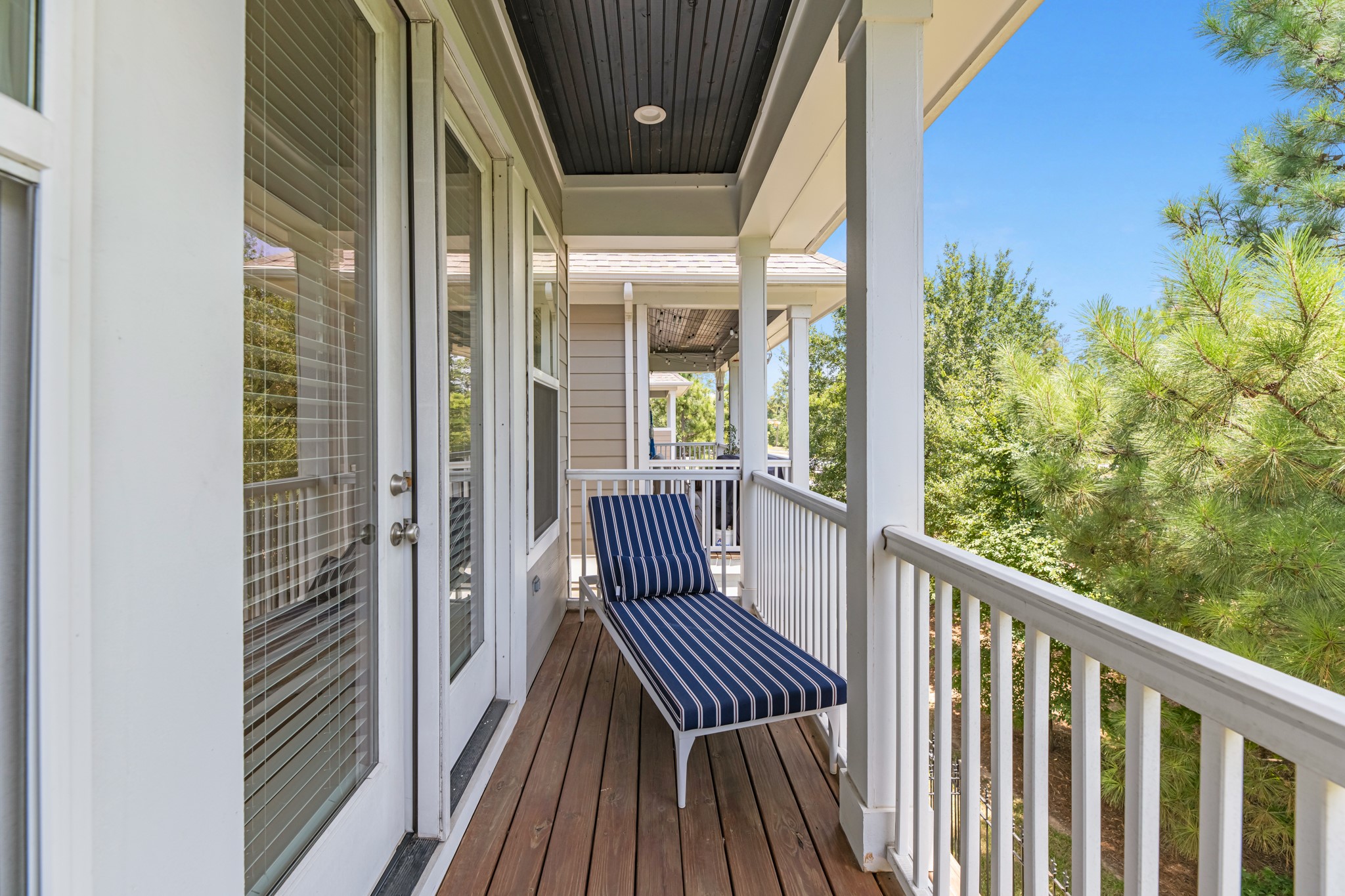11 Thorpe Lane Spring, TX 77389 - Photo 25 of 34 Private balcony off the primary bedroom offers a peaceful outdoor retreat—perfect for morning coffee or evening relaxation.