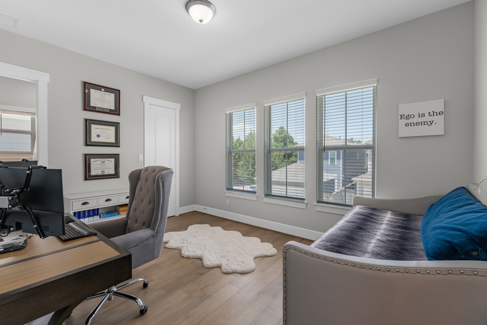 11 Thorpe Lane Spring, TX 77389 - Photo 32 of 34 Versatile secondary bedroom—perfect as a home office, guest room, or creative space to fit your lifestyle.