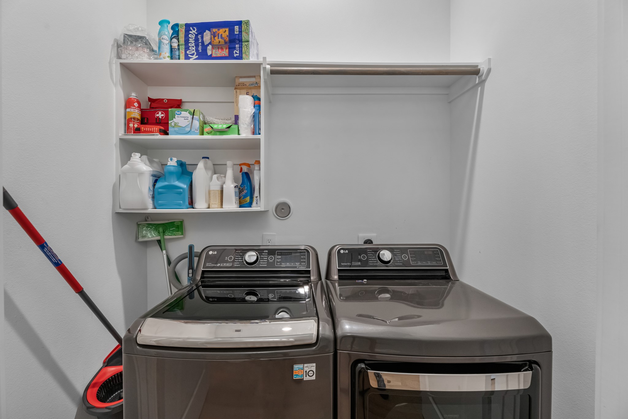 11 Thorpe Lane Spring, TX 77389 - Photo 34 of 34 The laundry room provides designated areas for washing, drying, and storing.