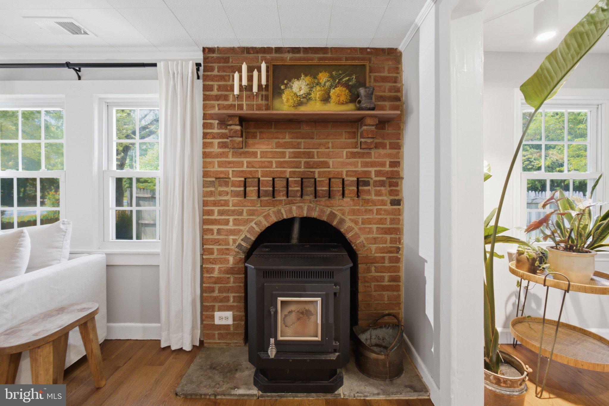5650 Deale Churchton Road Churchton, MD 20733 - Photo 9 of 31 Charming brick fireplace centerpiece.