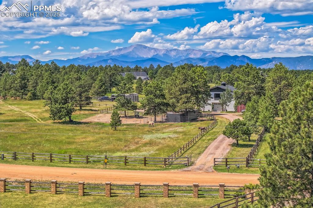 a view of a swimming pool with an outdoor seating