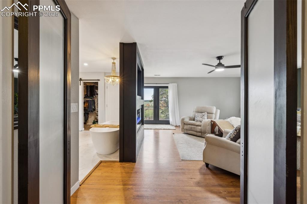 17940 Appaloosa Road Monument, CO 80132 - Photo 14 of 44 a living room with furniture and a fireplace