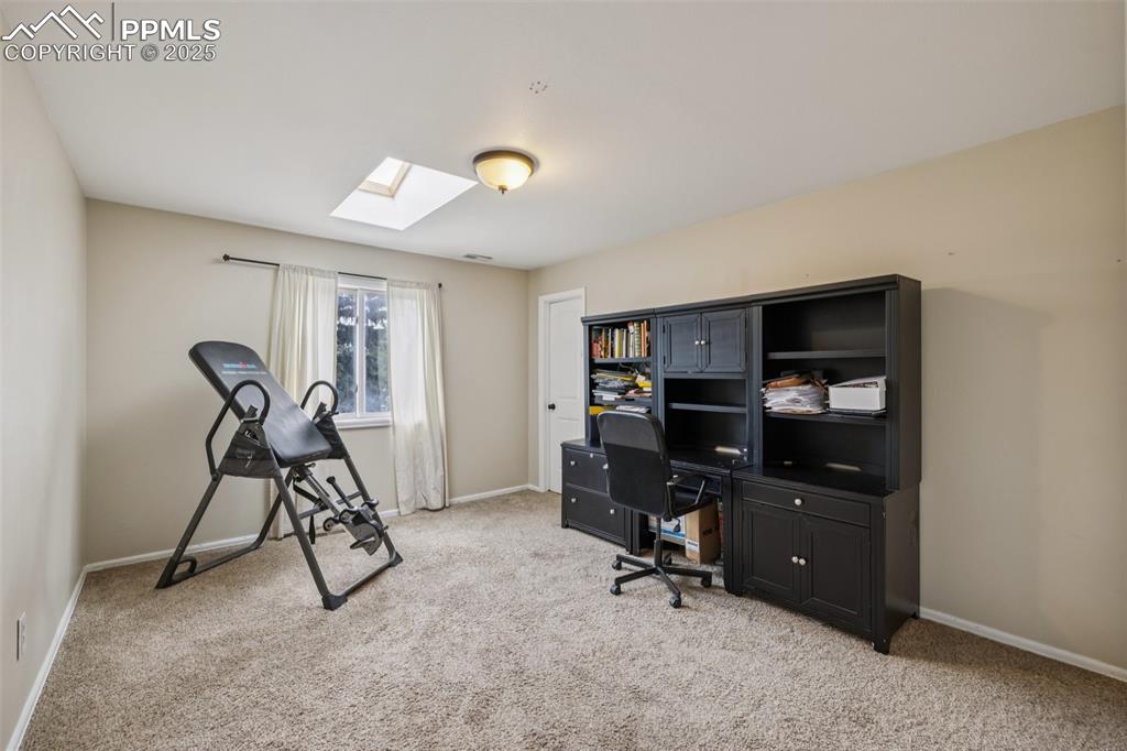 17940 Appaloosa Road Monument, CO 80132 - Photo 27 of 44 a view of a workspace with furniture