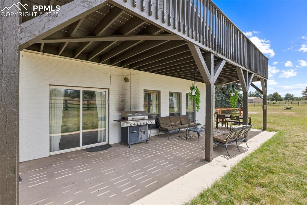 17940 Appaloosa Road Monument, CO 80132 - Photo 37 of 44 a view of a backyard with sitting area