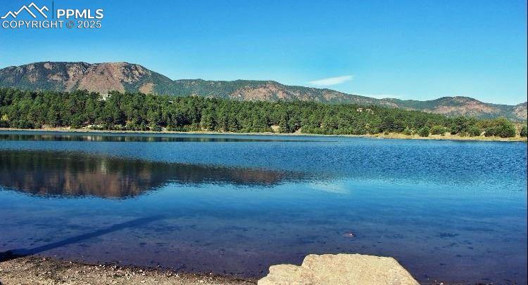 17940 Appaloosa Road Monument, CO 80132 - Photo 43 of 44 a view of lake with mountain