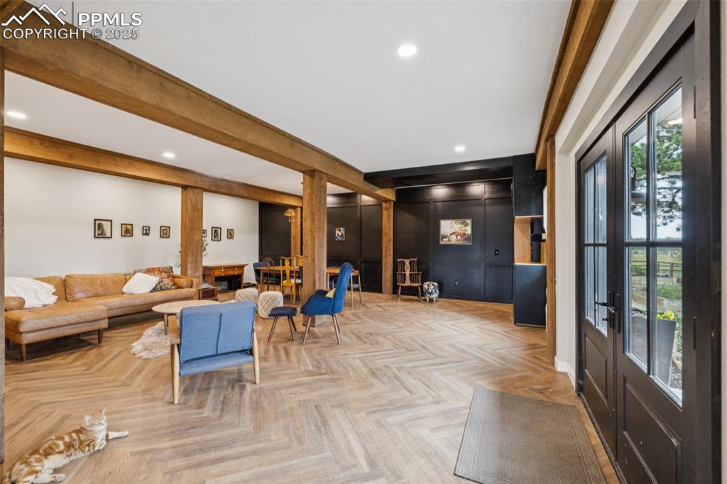 17940 Appaloosa Road Monument, CO 80132 - Photo 5 of 44 a view of a lobby with furniture and floor to ceiling window