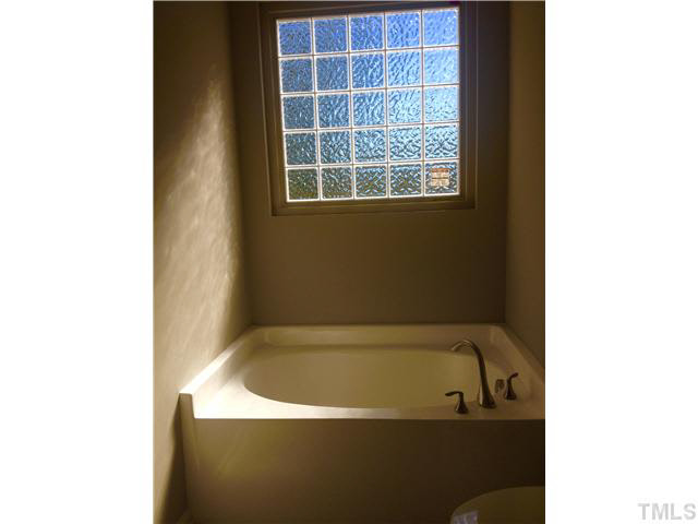 677 Wickham Ridge Road, Unit 147 Apex, NC 27539 - Photo 6 of 23 Master Bath