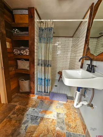 a view of an outdoor sitting area with furniture