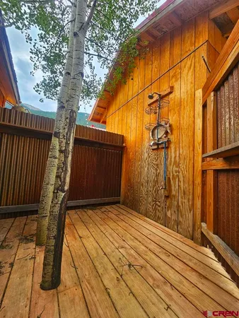 an aerial view of multi story residential apartment building with yard