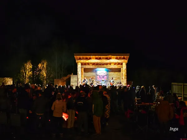 a balcony with table and chairs