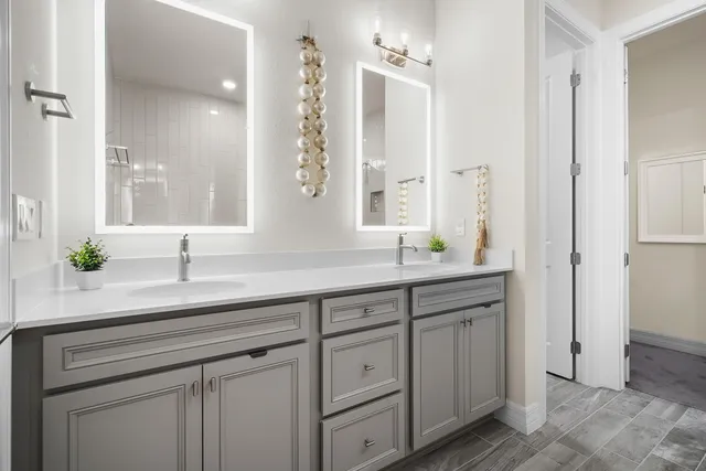 a view of a house with a garden and basketball court