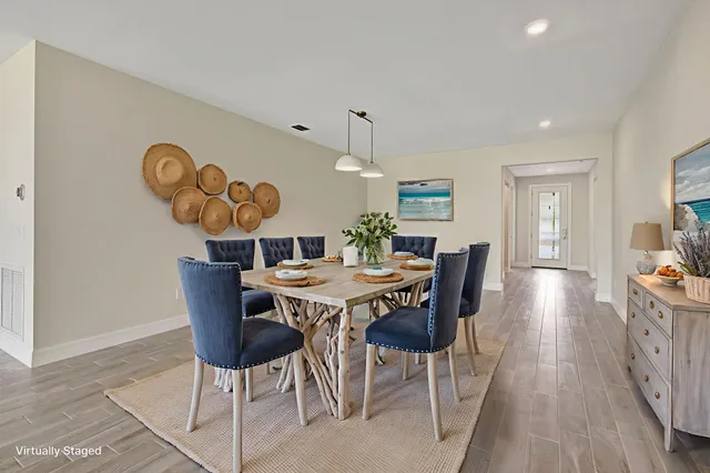 a kitchen with stainless steel appliances a sink stove and refrigerator