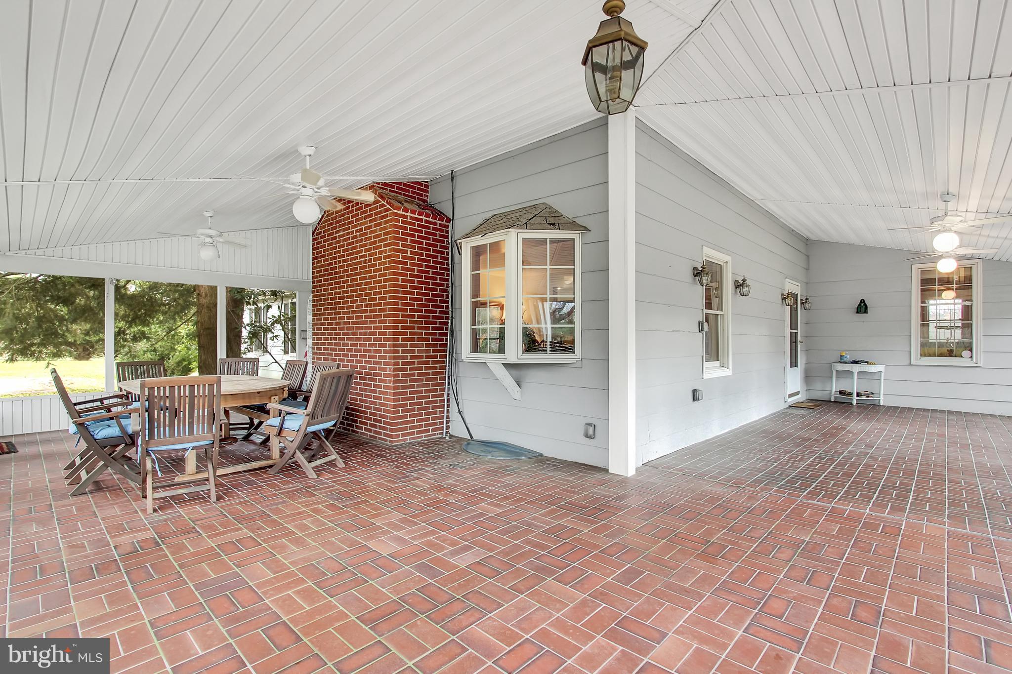 2000 Wilson Road White Hall, MD 21161 - Photo 10 of 49 "L-Shaped" screened Covered Porch