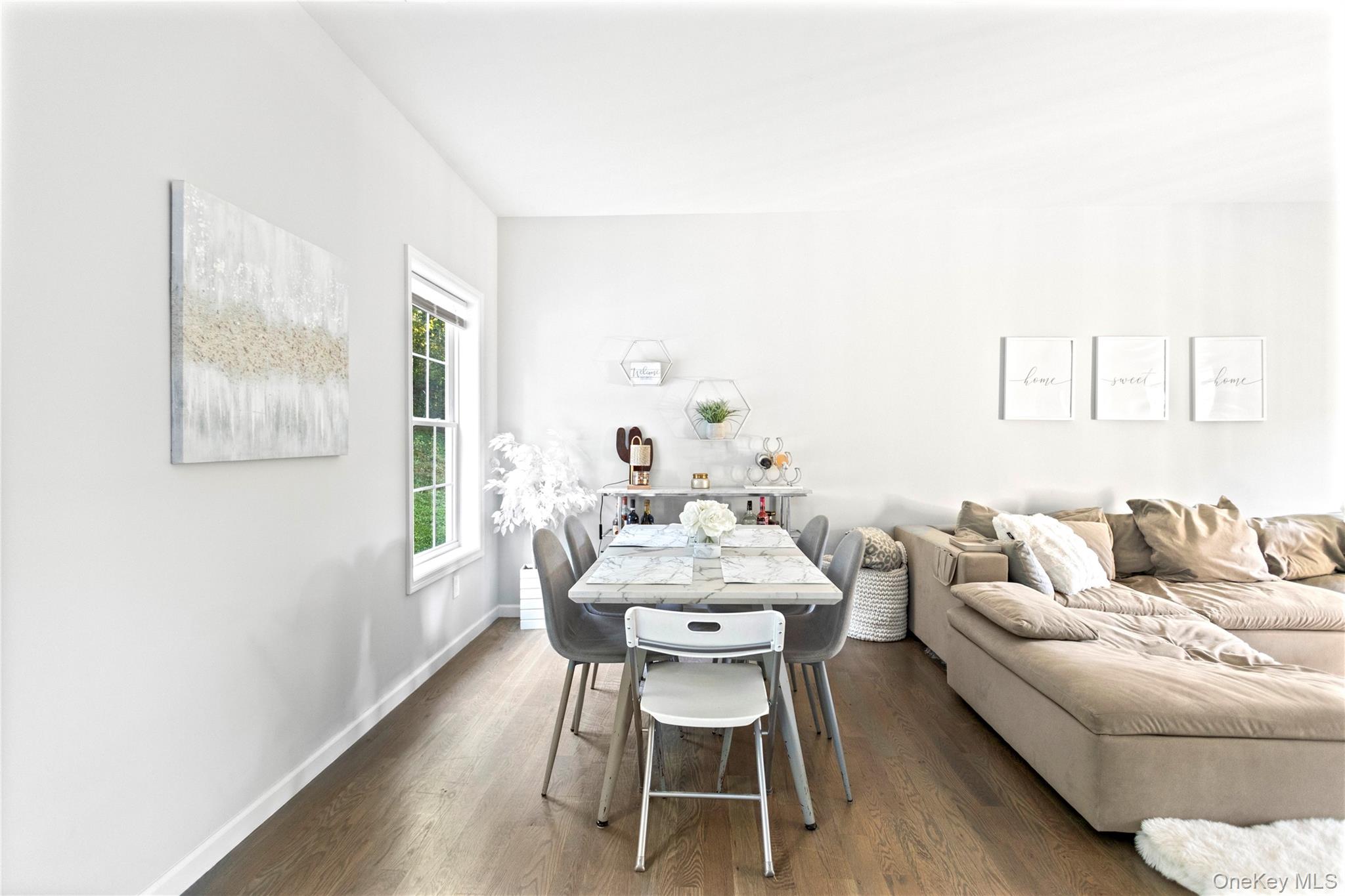 24 Belmont Road Sound Beach, NY 11789 - Photo 10 of 23 a dining room with furniture and window