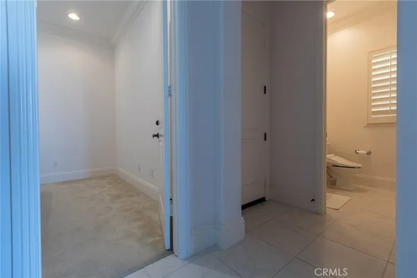 a view of a bathroom with a toilet