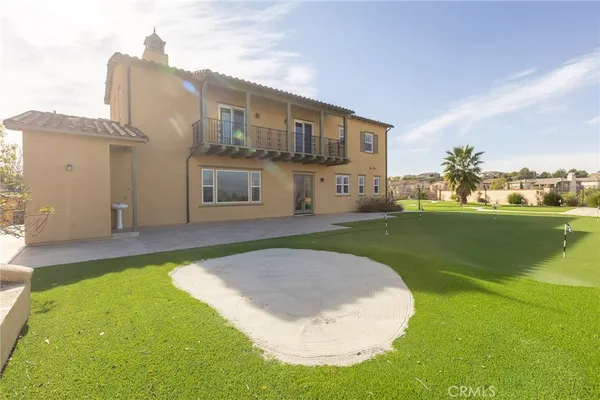 a view of a house with a big yard