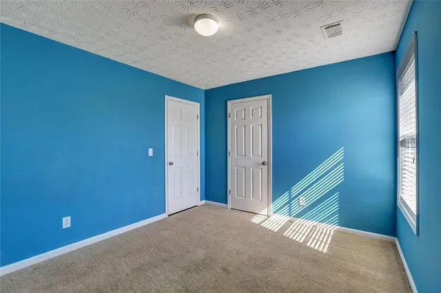 a view of a livingroom with a staircase