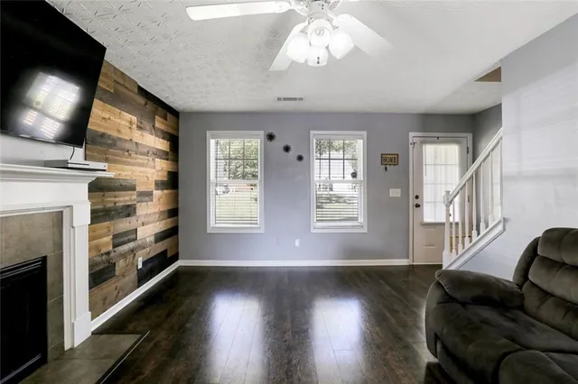 a view of livingroom with furniture wooden floor and window