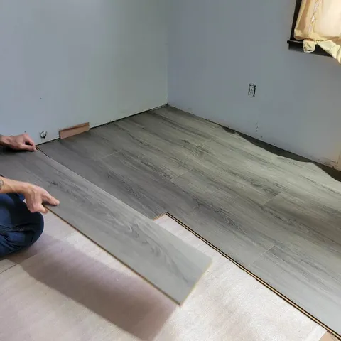 a living room with furniture and decor