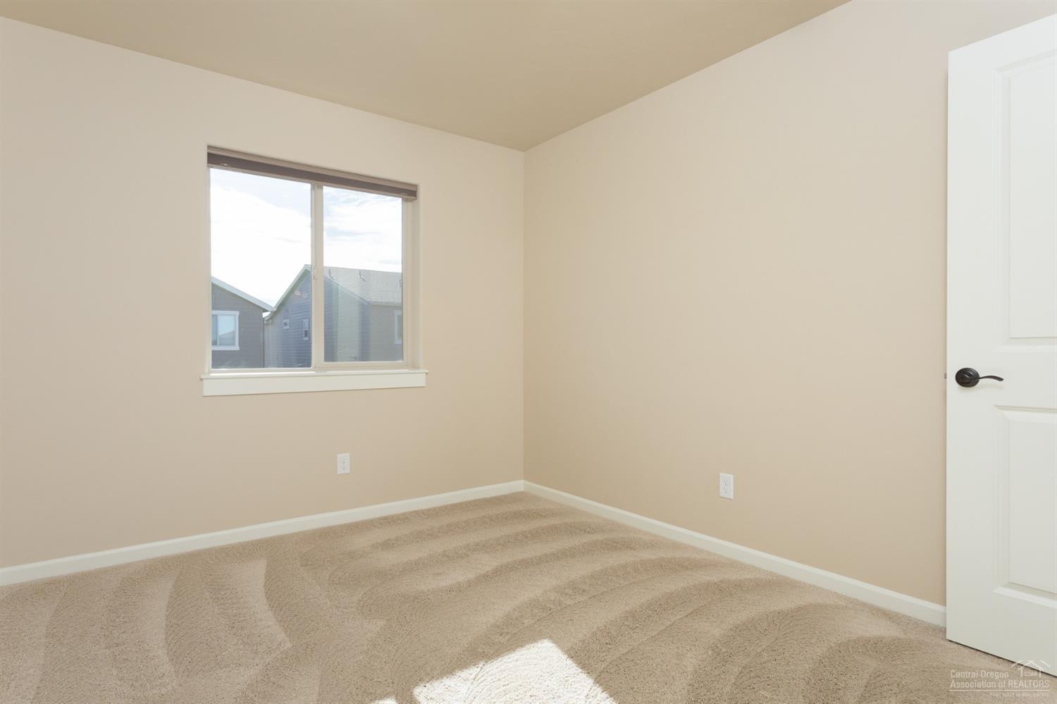 20945 Sotra Loop Bend, OR 97702 - Photo 14 of 25 Second upstairs bedroom with spacious cl