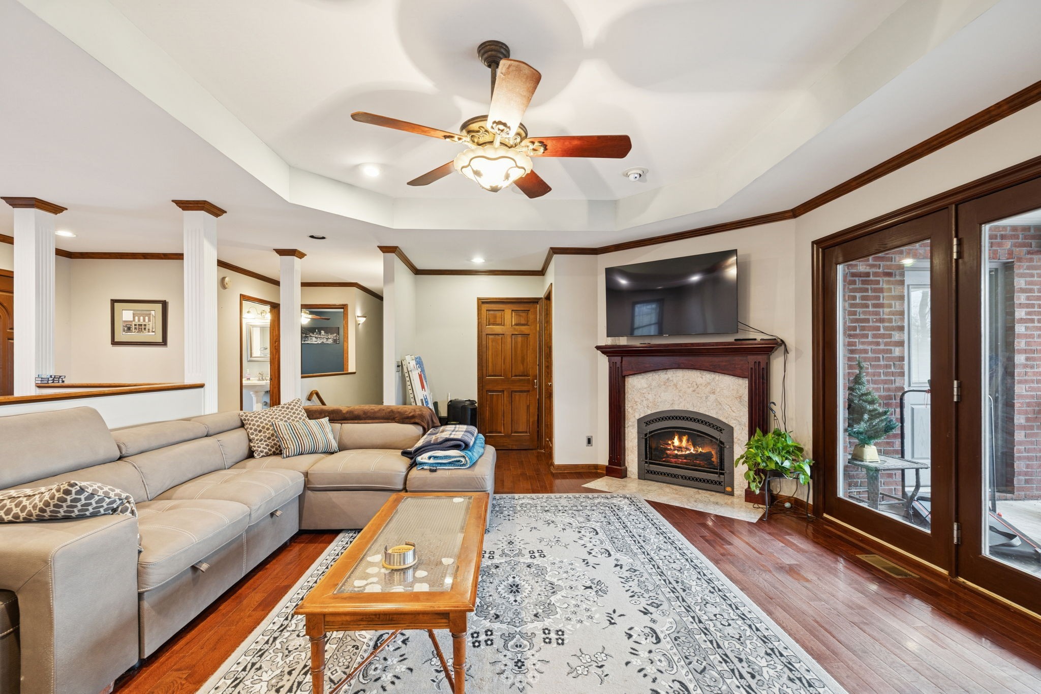 516 Rhotons Chapel Road Manchester, TN 37355 - Photo 12 of 52 a living room with furniture a fireplace and a flat screen tv