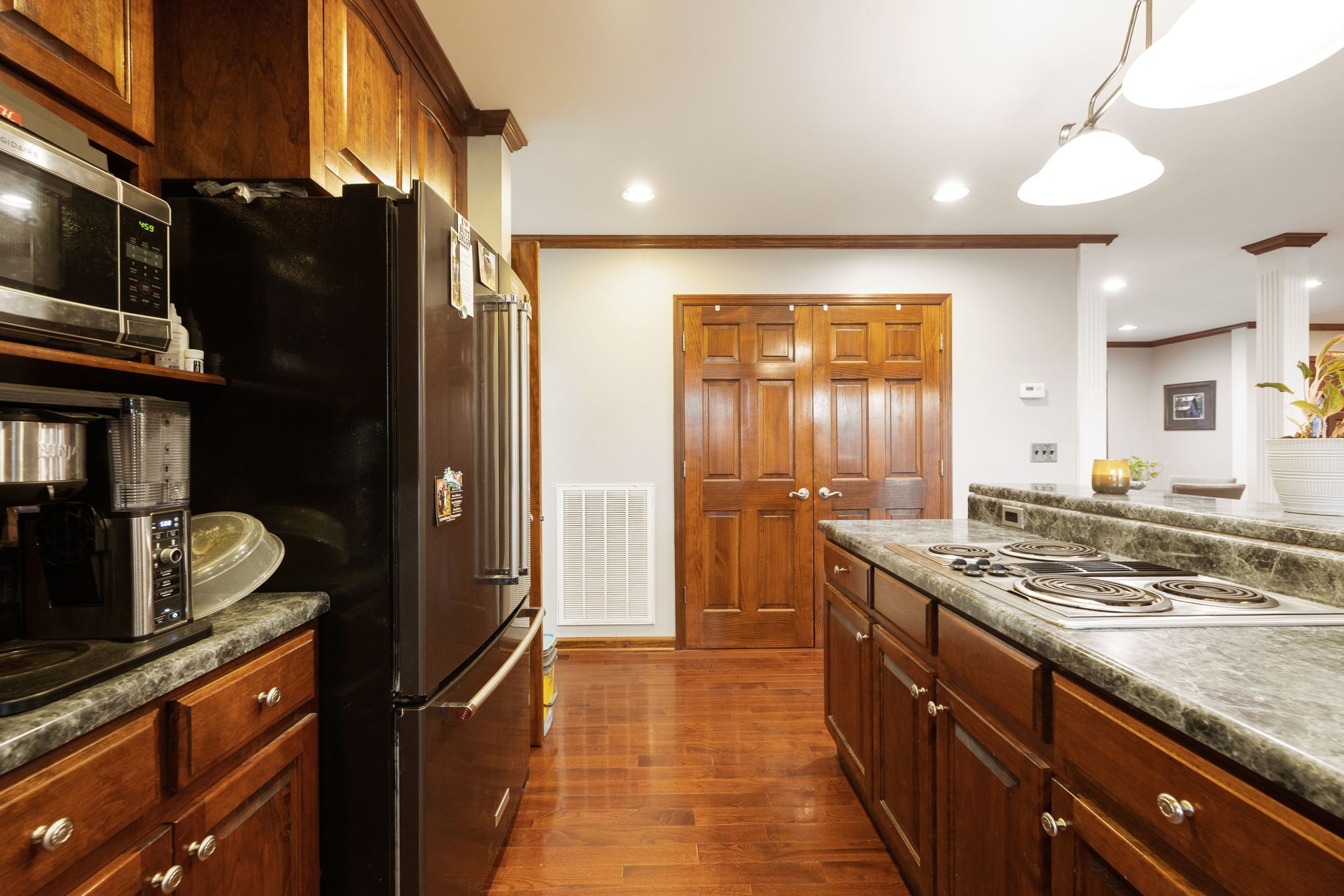 516 Rhotons Chapel Road Manchester, TN 37355 - Photo 17 of 52 a kitchen with stainless steel appliances granite countertop a refrigerator and a stove