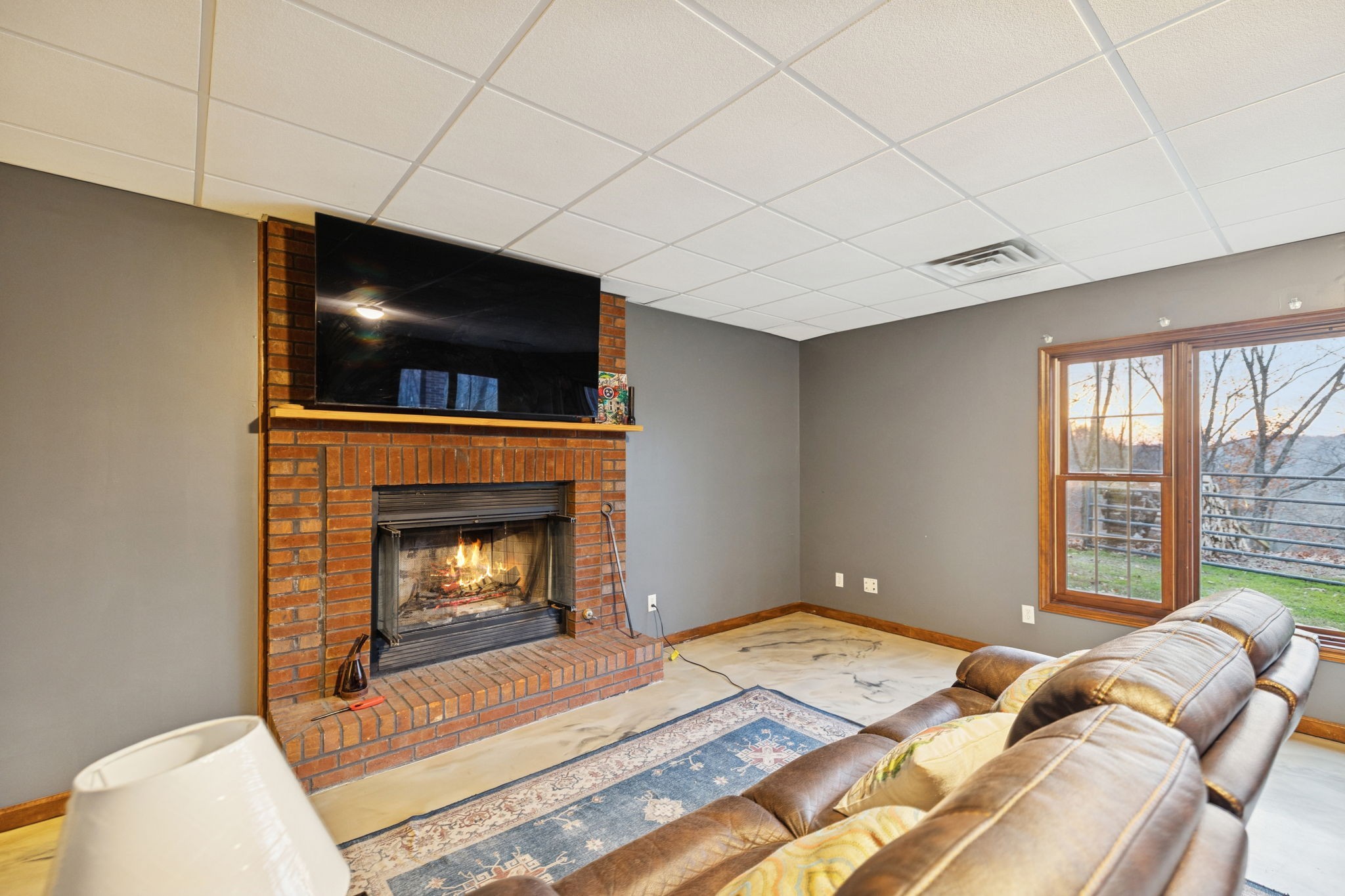 516 Rhotons Chapel Road Manchester, TN 37355 - Photo 28 of 52 a bedroom with a bed and a fireplace