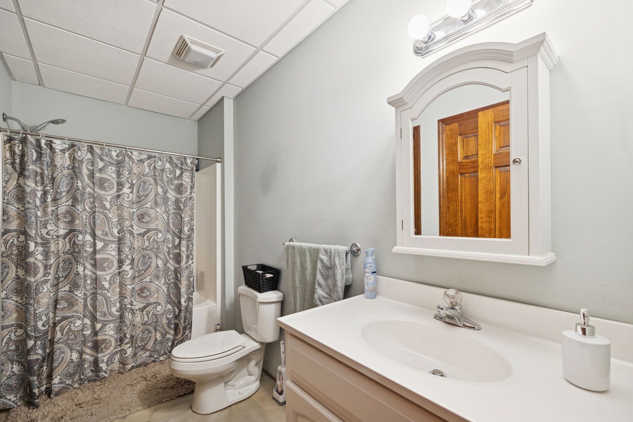 516 Rhotons Chapel Road Manchester, TN 37355 - Photo 30 of 52 a bathroom with a sink a toilet and shower curtain