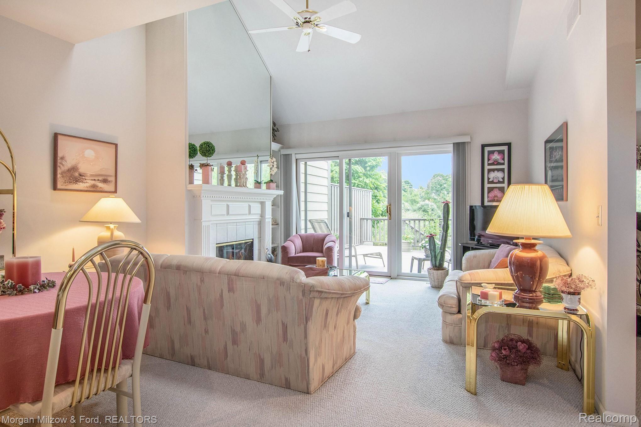 6582 Steeple Ridge Clarkston, MI 48346 - Photo 8 of 23 Bright & fire-lit, vaulted living room