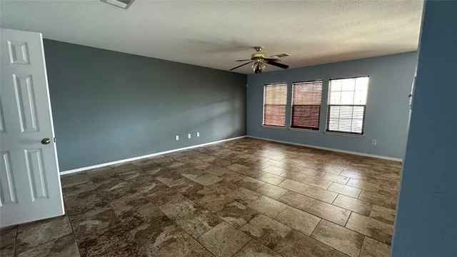 a kitchen with a refrigerator a stove top oven and sink