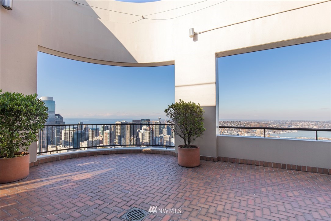 1301 Spring Street, Unit 18J Seattle, WA 98104 - Photo 23 of 25 a view of balcony with furniture