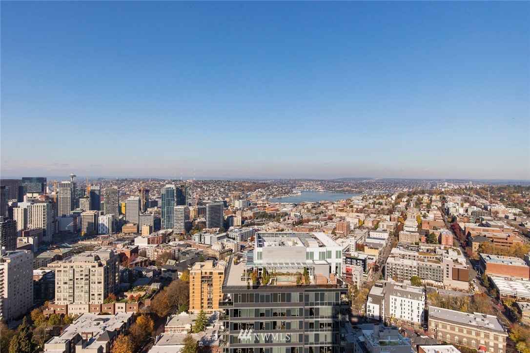 1301 Spring Street, Unit 18J Seattle, WA 98104 - Photo 24 of 25 an aerial view of a city