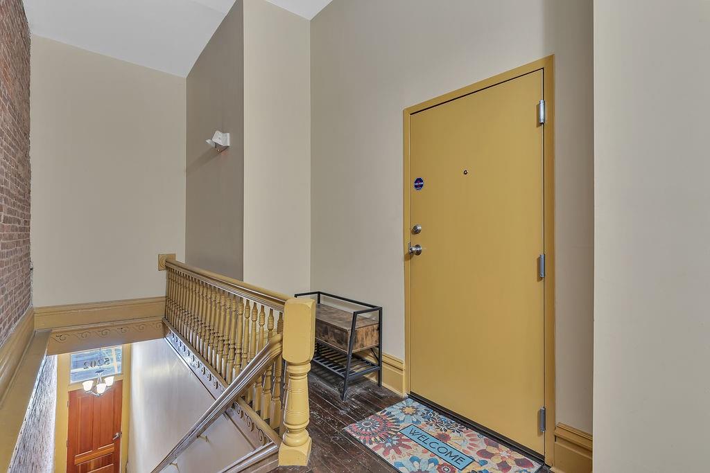 5202 Butler Street, Unit 1 Pittsburgh, PA 15201 - Photo 2 of 28 a view of hallway with dining room and stairs