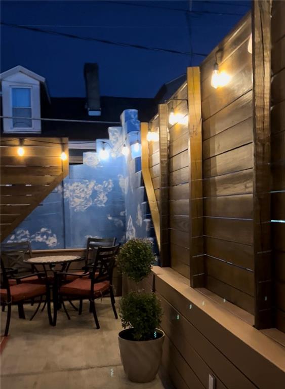 5202 Butler Street, Unit 1 Pittsburgh, PA 15201 - Photo 23 of 28 a bathroom with a sink and a mirror
