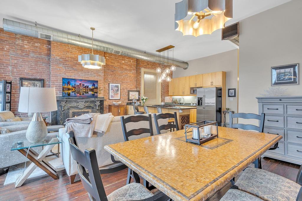 5202 Butler Street, Unit 1 Pittsburgh, PA 15201 - Photo 7 of 28 a view of a dining room with furniture