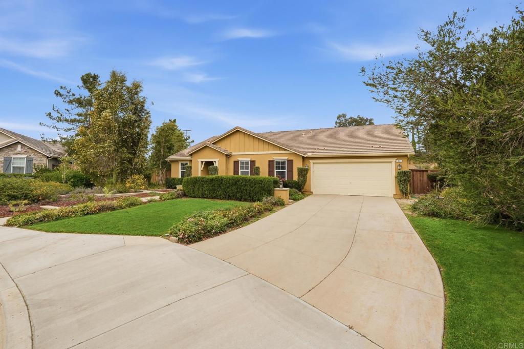 321 William Pittenger Place Fallbrook, CA 92028 - Photo 27 of 32 a front view of a house with a yard