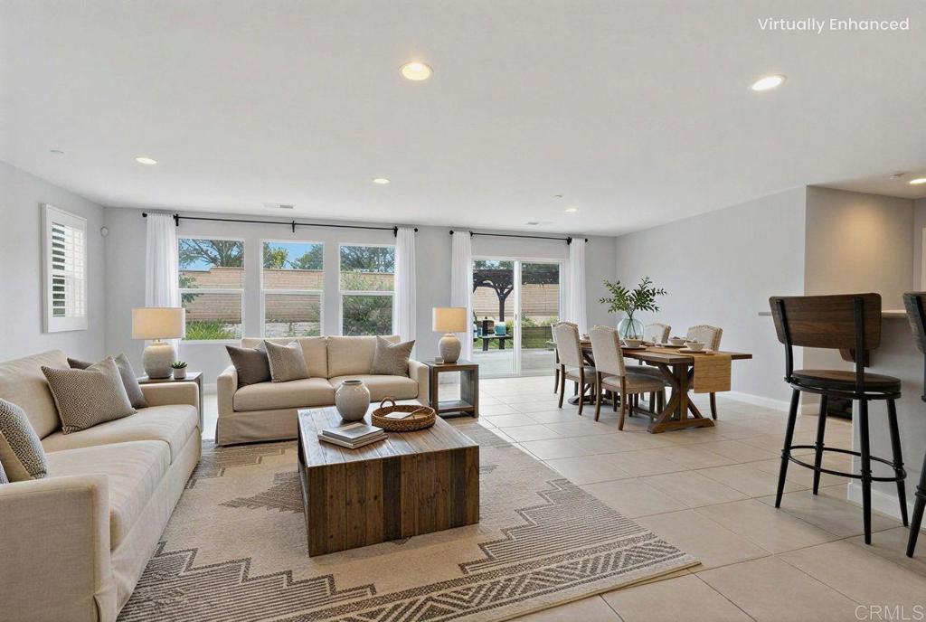 321 William Pittenger Place Fallbrook, CA 92028 - Photo 4 of 32 a living room with furniture and a large window
