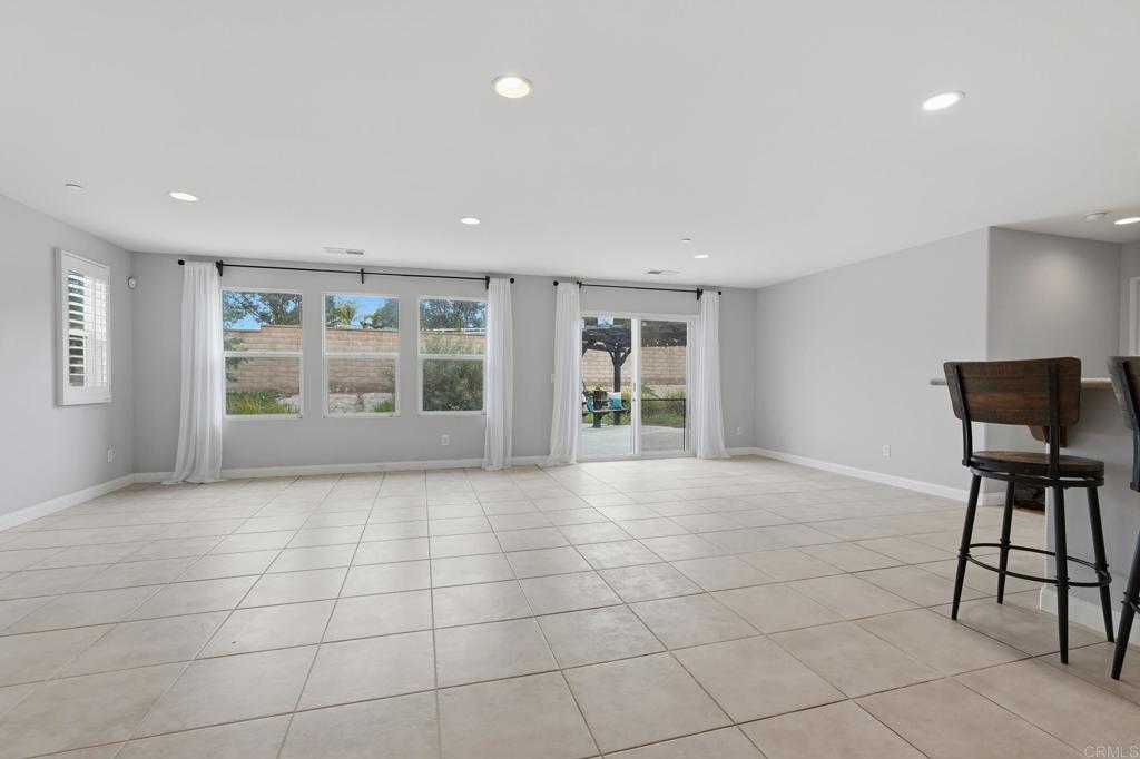321 William Pittenger Place Fallbrook, CA 92028 - Photo 5 of 32 a view of an empty room with a window