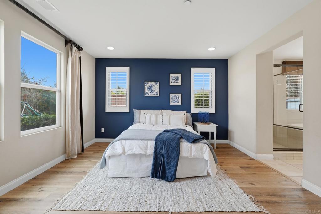 321 William Pittenger Place Fallbrook, CA 92028 - Photo 7 of 32 a bedroom with a large bed and a window