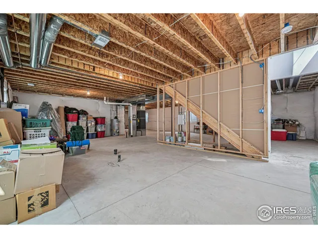 a outdoor living space with furniture and a view of kitchen
