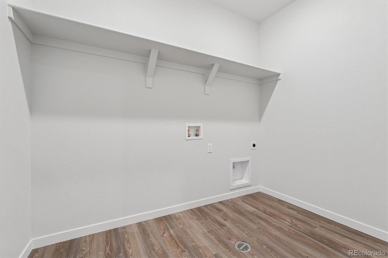 1446 Farmstead Street Brighton, CO 80601 - Photo 20 of 26 a view of an empty room