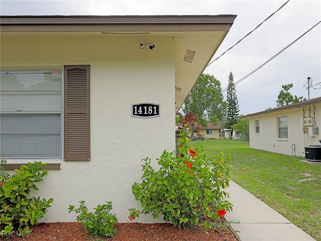 14181 Old Olga Road Fort Myers, FL 33905 - Photo 1 of 13 a view of a house with a garden