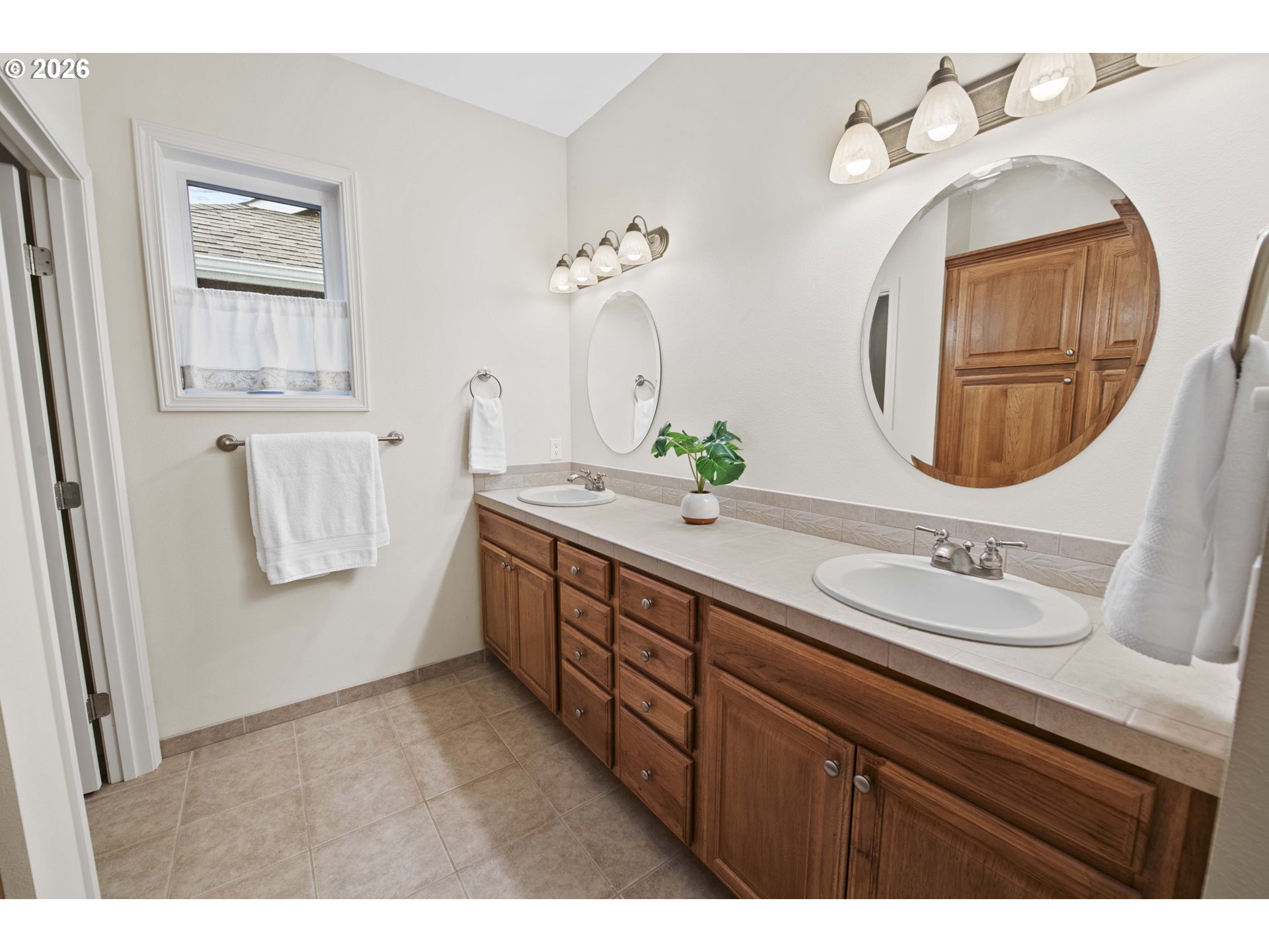 230 Round House Road Astoria, OR 97103 - Photo 23 of 43 a bathroom with a sink and a mirror