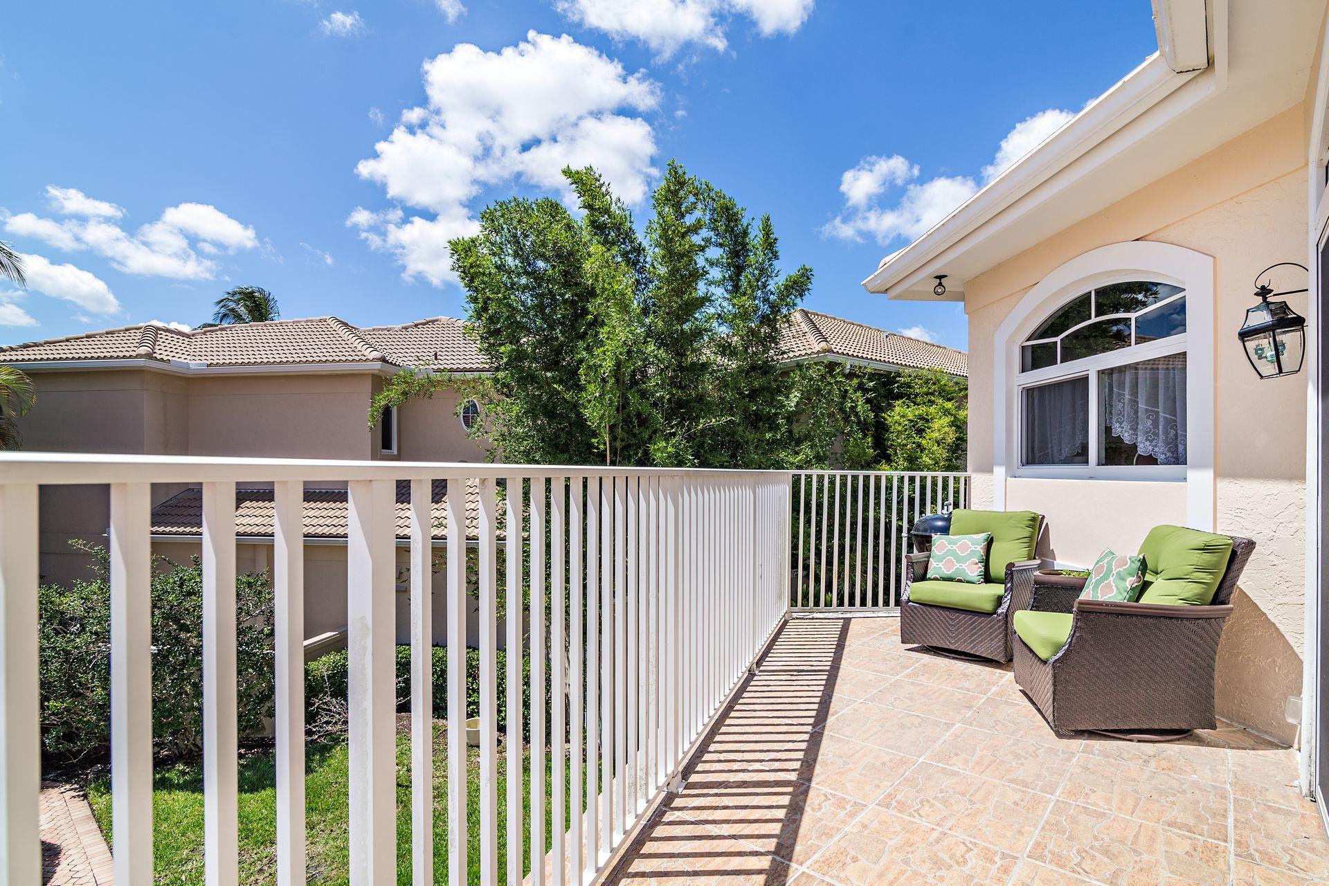 16757 Port Royal Circle Jupiter, FL 33477 - Photo 36 of 65 a view of a porch with furniture