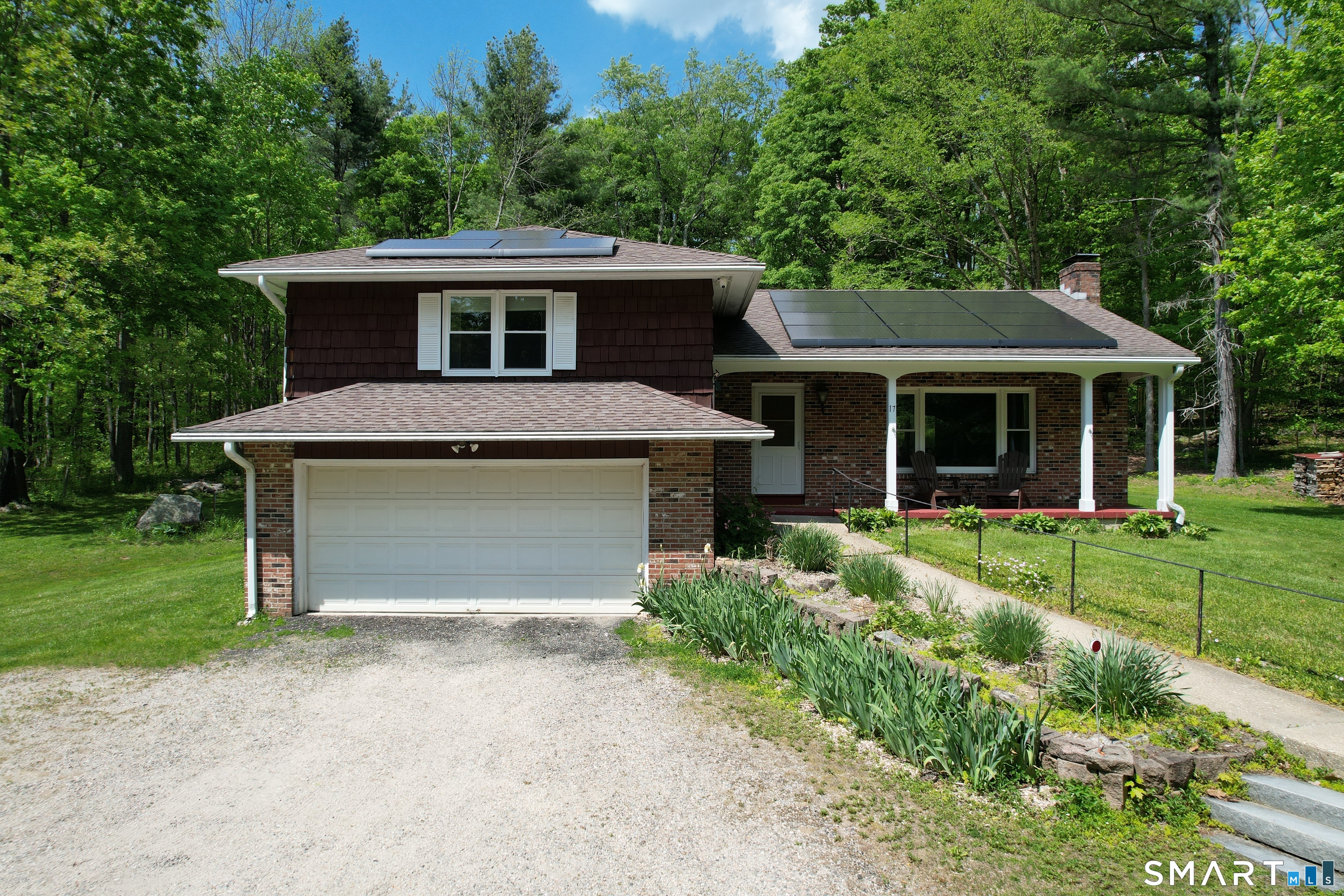 17 Colebrook Road Norfolk, CT 06058 - Photo 1 of 21 front view of a house with a yard