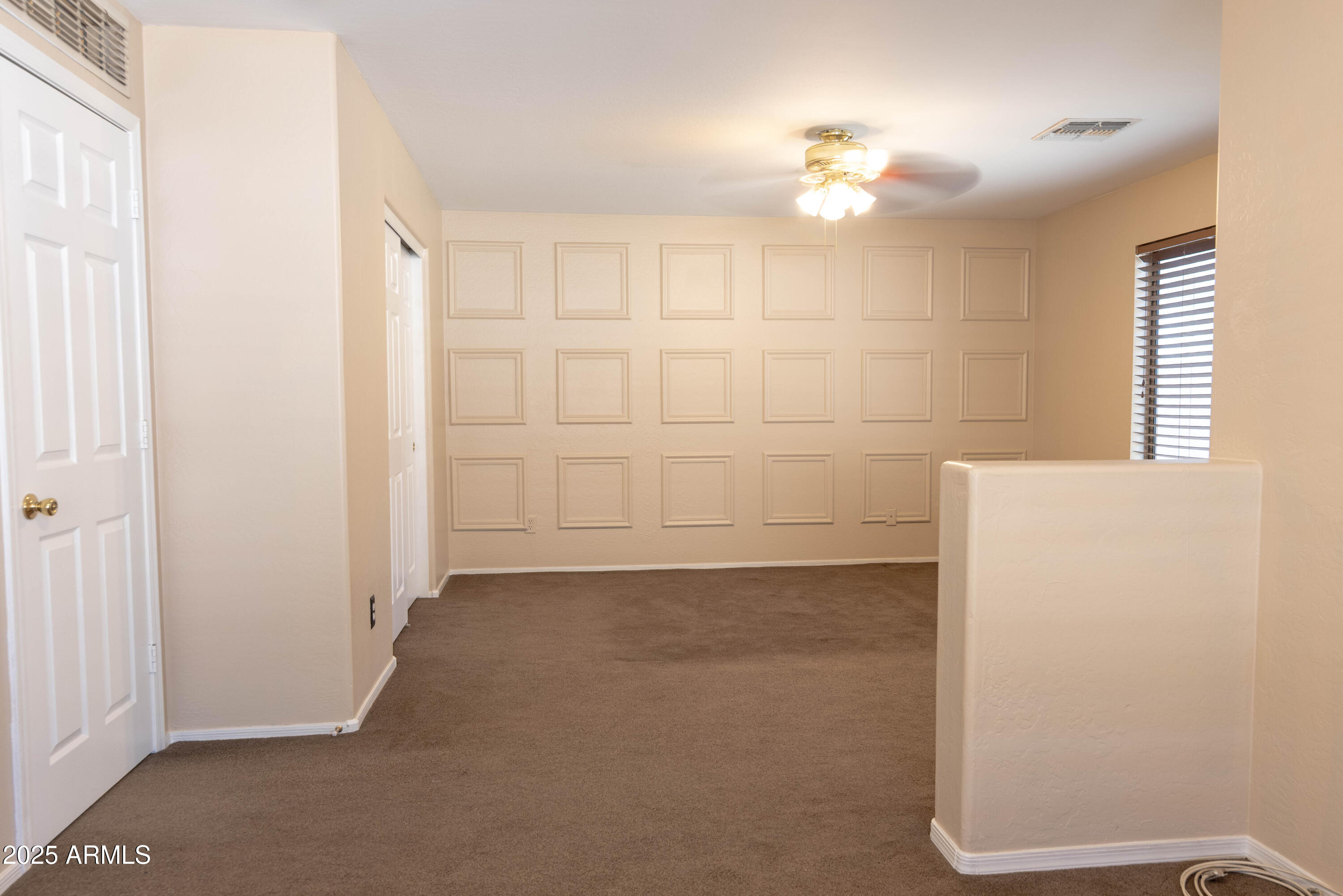 10649 West Monte Vista Road Avondale, AZ 85392 - Photo 13 of 28 an empty room with a bathroom