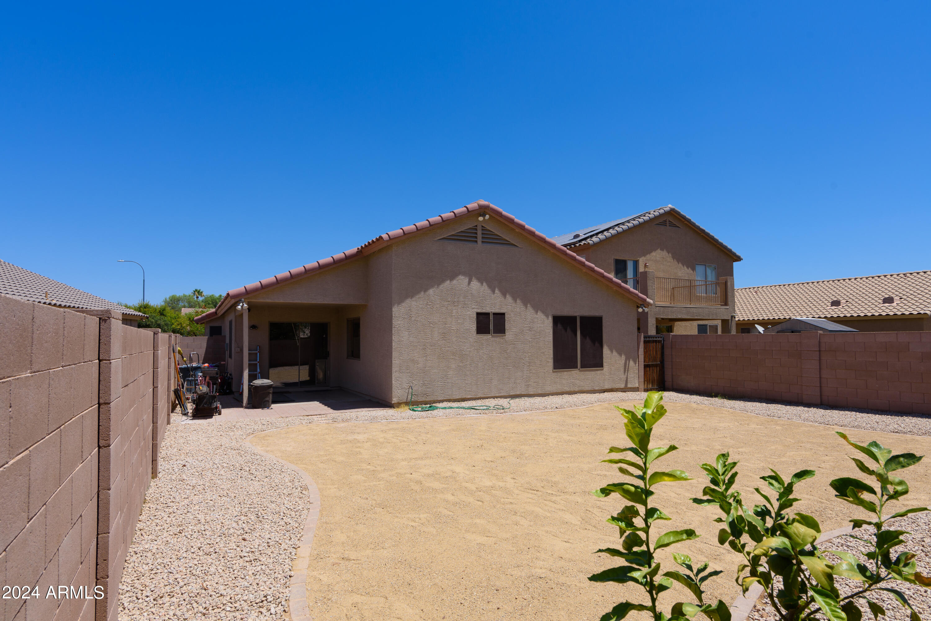 10649 West Monte Vista Road Avondale, AZ 85392 - Photo 25 of 28 a view of a house with a yard